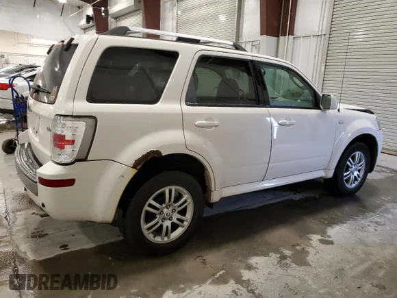 ✅ 2009 Mercury Mariner Premier • VIN: 4M2CU97G19KJ01651 • Лот: 81848344. Опубликован ранее на Copart с пробегом 143 444 миль. Бесплатный доступ к архиву аукционных продаж из США и подробный отчёт об истории автомобиля на DreamBid. Изображение 3.