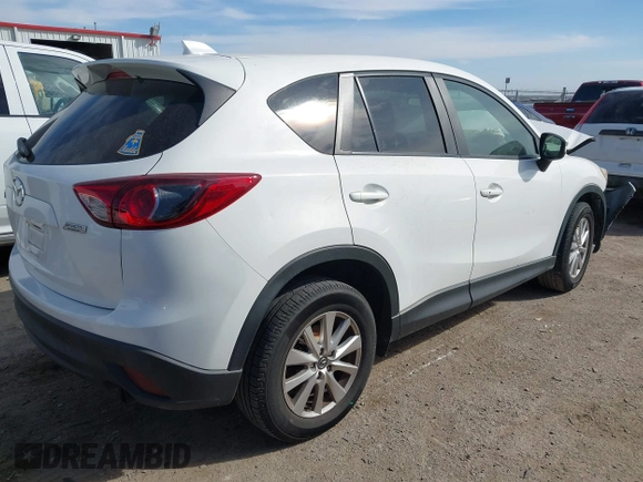 ✅ 2015 Mazda CX-5 Touring • VIN: JM3KE2CY5F0529158 • Lot: 44090388. Wystawiony na IAAI z przebiegiem 103 477 mil. Bezpłatny archiwum sprzedaży aukcyjnych z USA i szczegółowy raport historii pojazdu na DreamBid. Zdjęcie 4.