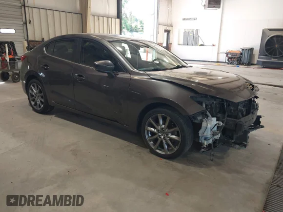 ✅ 2018 Mazda 3 Touring • VIN: 3MZBN1V31JM247803 • Lot: 45387222. Listed on IAAI with 99,165 mi. Free auction sales archive from the USA and detailed vehicle history report at DreamBid. Image 1.