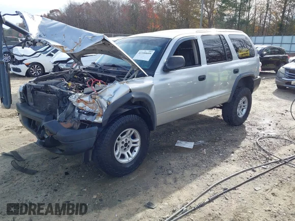 ✅ 2003 Dodge Durango Sport • VIN: 1D4HS38N93F580870 • Лот: 41100609. Опубліковано раніше на IAAI з пробігом 261 174 миль. Безкоштовний доступ до архіву аукціонних продажів зі США та докладний звіт про історію автомобіля на DreamBid. Зображення 2.