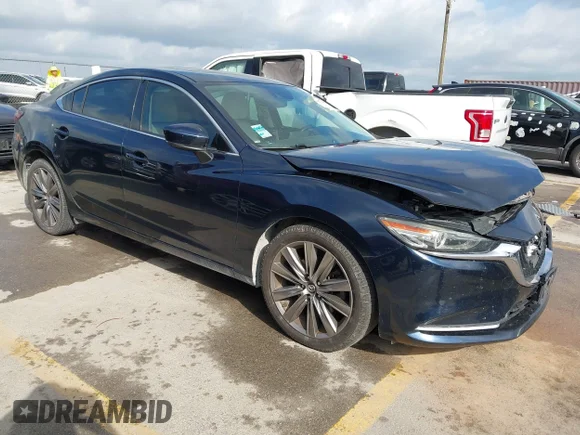 ✅ 2019 Mazda 6 Grand Touring Reserve • VIN: JM1GL1WY9K1506495 • Lot: 44872490. Wystawiony na IAAI z przebiegiem 94 093 mil. Bezpłatny archiwum sprzedaży aukcyjnych z USA i szczegółowy raport historii pojazdu na DreamBid. Zdjęcie 1.
