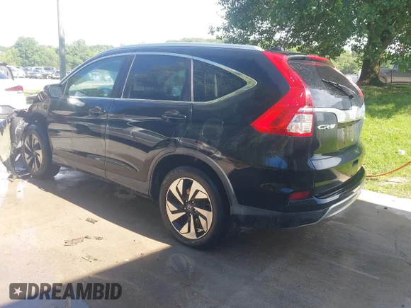 ✅ 2015 Honda CR-V Touring • VIN: 5J6RM4H99FL127241 • Lot: 45057926. Wystawiony na IAAI z przebiegiem 186 287 mil. Bezpłatny archiwum sprzedaży aukcyjnych z USA i szczegółowy raport historii pojazdu na DreamBid. Zdjęcie 3.
