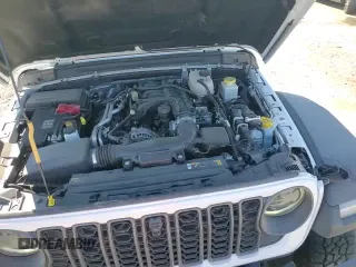 ✅ 2024 Jeep Gladiator Rubicon • VIN: 1C6JJTBG1RL113701 • Лот: 82170955. Опубликован ранее на Copart с пробегом 9 573 миль. Бесплатный доступ к архиву аукционных продаж из США и подробный отчёт об истории автомобиля на DreamBid. Изображение 15.