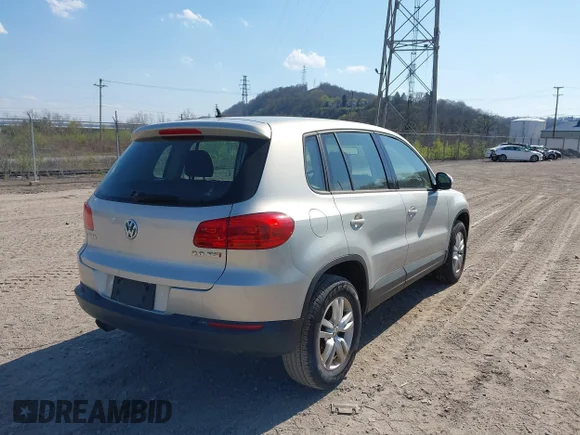✅ 2014 Volkswagen Tiguan S • VIN: WVGAV3AX8EW572839 • Lot: 44825438. Listed on IAAI with 147,224 mi. Free auction sales archive from the USA and detailed vehicle history report at DreamBid. Image 4.