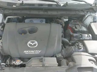 ✅ 2015 Mazda CX-5 Touring • VIN: JM3KE2CY1F0456676 • Lot: 41961058. Listed on IAAI with 140,018 mi. Free auction sales archive from the USA and detailed vehicle history report at DreamBid. Image 18.