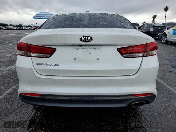 ✅ 2016 Kia Optima LX • VIN: KNAGT4L39G5101048 • Lot: 77599105. Wystawiony na Copart z przebiegiem 99 317 mil. Bezpłatny archiwum sprzedaży aukcyjnych z USA i szczegółowy raport historii pojazdu na DreamBid. Zdjęcie 6.