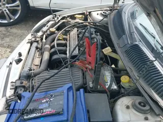 2000 Dodge Neon Highline z VIN 1B3ES46C0YD660408, wystawiony jako IAAI lot #42161341 z przebiegiem 184 787 mil mil oraz . Historia ofert i sprzedaży dostępna na DreamBid. Obrazek 12.