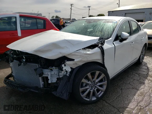 ✅ 2022 Mazda 3 Select • VIN: 3MZBPABLXNM308392 • Лот: 57661282. Опубликован ранее на Copart с пробегом 333 миль. Бесплатный доступ к архиву аукционных продаж из США и подробный отчёт об истории автомобиля на DreamBid. Изображение 2.