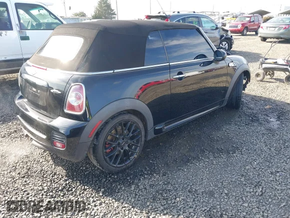 ✅ 2015 MINI Convertible • VIN: WMWMR9C56FT499491 • Лот: 41691863. Опубліковано раніше на IAAI з пробігом 86 571 миль. Безкоштовний доступ до архіву аукціонних продажів зі США та докладний звіт про історію автомобіля на DreamBid. Зображення 4.