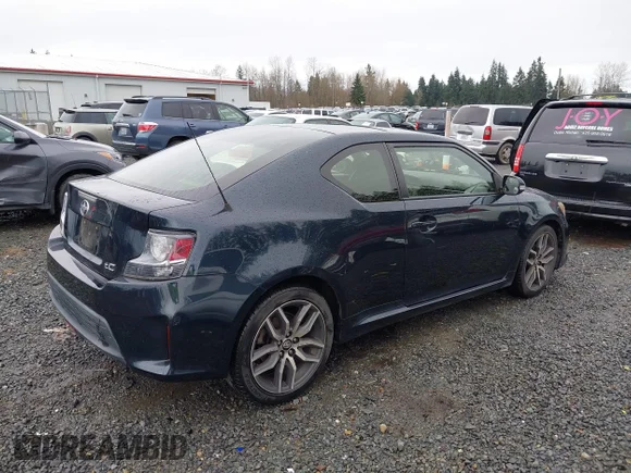 ✅ 2015 Scion tC • VIN: JTKJF5C70F3094065 • Lot: 44642596. Wystawiony na IAAI z przebiegiem 127 017 mil. Bezpłatny archiwum sprzedaży aukcyjnych z USA i szczegółowy raport historii pojazdu na DreamBid. Zdjęcie 4.