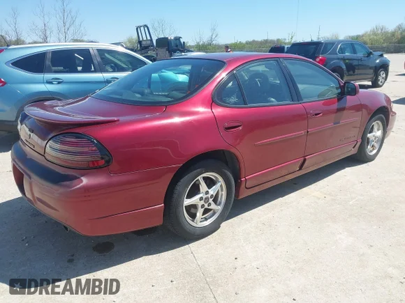 ✅ 2000 Pontiac Grand Prix GT • VIN: 1G2WP52K2YF274153 • Лот: 44789540. Опубліковано раніше на IAAI з пробігом 128 674 миль. Безкоштовний доступ до архіву аукціонних продажів зі США та докладний звіт про історію автомобіля на DreamBid. Зображення 4.