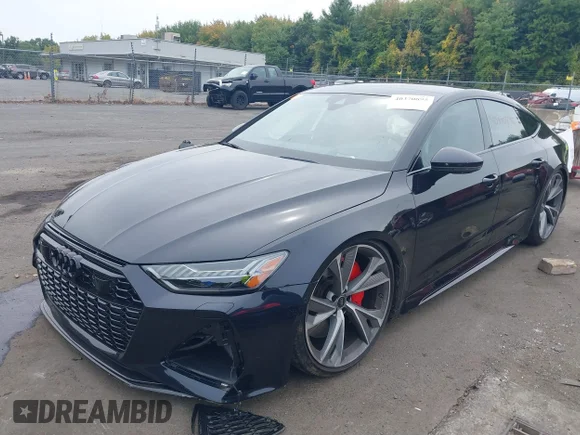 ✅ 2021 Audi RS 7 • VIN: WUAPCBF26MN902755 • Лот: 40370895. Опубликован ранее на IAAI с пробегом 28 690 миль. Бесплатный доступ к архиву аукционных продаж из США и подробный отчёт об истории автомобиля на DreamBid. Изображение 2.