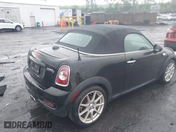 ✅ 2013 MINI Roadster S • VIN: WMWSY3C50DT566042 • Lot: 42264418. Listed on IAAI with 84,762 mi. Free auction sales archive from the USA and detailed vehicle history report at DreamBid. Image 4.