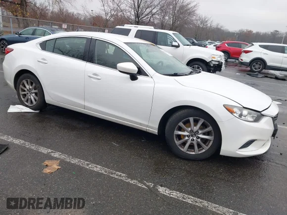 ✅ 2016 Mazda 6 i Sport • VIN: JM1GJ1U51G1472221 • Lot: 43790481. Listed on IAAI with 199,601 mi. Free auction sales archive from the USA and detailed vehicle history report at DreamBid. Image 1.