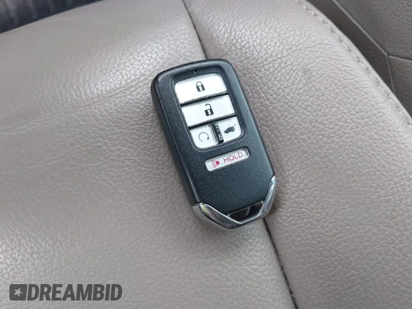 ✅ 2020 Honda Pilot EX-L • VIN: 5FNYF5H53LB020022 • Lot: 45102638. Listed on IAAI with 55,164 mi. Free auction sales archive from the USA and detailed vehicle history report at DreamBid. Image 11.