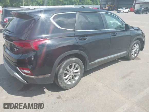 ✅ 2019 Hyundai Santa Fe SE • VIN: 5NMS23AD6KH030807 • Lot: 45207842. Listed on IAAI with 161,044 mi. Free auction sales archive from the USA and detailed vehicle history report at DreamBid. Image 4.
