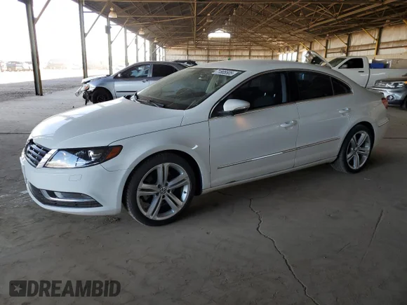 ✅ 2013 Volkswagen CC Sport • VIN: WVWBP7AN1DE512608 • Лот: 71805505. Опубликован ранее на Copart с пробегом 113 815 миль. Бесплатный доступ к архиву аукционных продаж из США и подробный отчёт об истории автомобиля на DreamBid. Изображение 1.