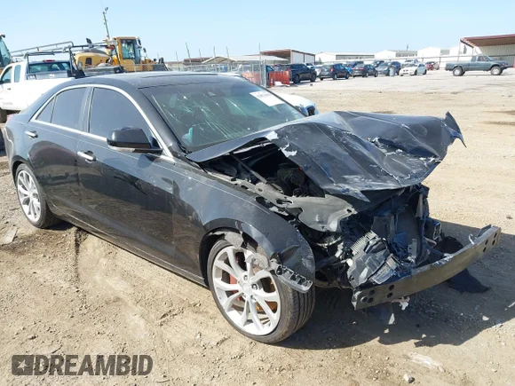 ✅ 2015 Cadillac ATS Performance RWD • VIN: 1G6AC5SX2F0112443 • Лот: 42852688. Опубликован ранее на IAAI с пробегом 145 175 миль. Бесплатный доступ к архиву аукционных продаж из США и подробный отчёт об истории автомобиля на DreamBid. Изображение 1.