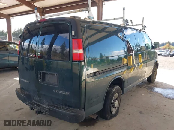 ✅ 2006 Chevrolet Express Cargo • VIN: 1GCHG35U961271623 • Lot: 43345381. Listed on IAAI with 218,399 mi. Free auction sales archive from the USA and detailed vehicle history report at DreamBid. Image 4.