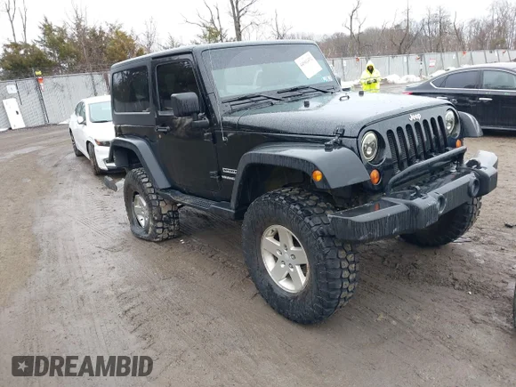 ✅ 2013 Jeep Wrangler Sport • VIN: 1C4GJWAG7DL623971 • Lot: 44502432. Listed on IAAI with 140,025 mi. Free auction sales archive from the USA and detailed vehicle history report at DreamBid. Image 1.