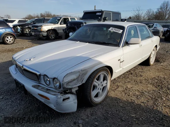 ✅ 1999 Jaguar XJ • VIN: SAJPX1841XC865402 • Lot: 46294005. Listed on Copart with 128,814 mi. Free auction sales archive from the USA and detailed vehicle history report at DreamBid. Image 1.