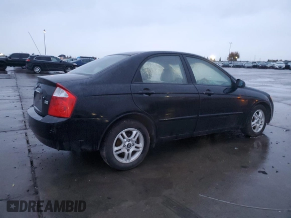 ✅ 2005 Kia Spectra LX • VIN: KNAFE121055078373 • Lot: 82250804. Wystawiony na Copart z przebiegiem 167 903 mil. Bezpłatny archiwum sprzedaży aukcyjnych z USA i szczegółowy raport historii pojazdu na DreamBid. Zdjęcie 3.