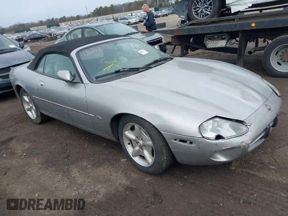 ✅ 1999 Jaguar XK • VIN: SAJGX2041XC039070 • Лот: 41684098. Опубликован ранее на IAAI с пробегом Не указан. Бесплатный доступ к архиву аукционных продаж из США и подробный отчёт об истории автомобиля на DreamBid. Изображение 1.