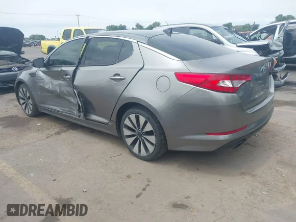 ✅ 2012 Kia Optima SX • VIN: 5XXGR4A65CG001971 • Лот: 45131051. Опубліковано раніше на IAAI з пробігом 129 276 миль. Безкоштовний доступ до архіву аукціонних продажів зі США та докладний звіт про історію автомобіля на DreamBid. Зображення 3.