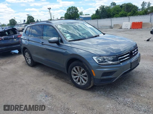 ✅ 2018 Volkswagen Tiguan S • VIN: 3VV0B7AX8JM131322 • Лот: 45354579. Опубликован ранее на IAAI с пробегом 67 117 миль. Бесплатный доступ к архиву аукционных продаж из США и подробный отчёт об истории автомобиля на DreamBid. Изображение 1.