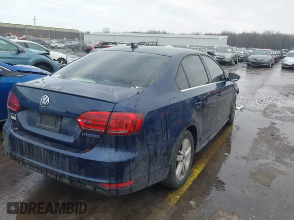 ✅ 2014 Volkswagen Jetta Hybrid • VIN: 3VW637AJ8EM215855 • Лот: 43960428. Опубліковано раніше на IAAI з пробігом 124 217 миль. Безкоштовний доступ до архіву аукціонних продажів зі США та докладний звіт про історію автомобіля на DreamBid. Зображення 4.