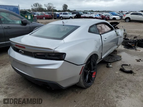 ✅ 2017 Chevrolet Camaro 1LT • VIN: 1G1FB1RX1H0199297 • Lot: 66951382. Wystawiony na Copart z przebiegiem Nie podano. Bezpłatny archiwum sprzedaży aukcyjnych z USA i szczegółowy raport historii pojazdu na DreamBid. Zdjęcie 4.