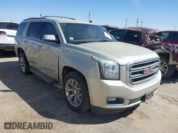 ✅ 2015 GMC Yukon SLT • VIN: 1GKS1BKC1FR145694 • Lot: 41851644. Listed on IAAI with 162,592 mi. Free auction sales archive from the USA and detailed vehicle history report at DreamBid. Image 1.
