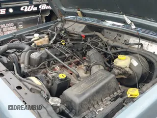 ✅ 1999 Jeep Cherokee Sport • VIN: 1J4FF68S7XL513640 • Lot: 42913382. Listed on IAAI with 207,133 mi. Free auction sales archive from the USA and detailed vehicle history report at DreamBid. Image 12.