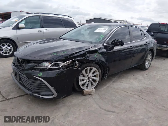 ✅ 2022 Toyota Camry LE • VIN: 4T1C11AKXNU707540 • Лот: 44991995. Опубліковано раніше на IAAI з пробігом 95 857 миль. Безкоштовний доступ до архіву аукціонних продажів зі США та докладний звіт про історію автомобіля на DreamBid. Зображення 2.
