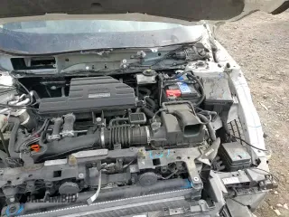 ✅ 2021 Honda CR-V Touring • VIN: 2HKRW2H98MH626067 • Lot: 91801095. Wystawiony na Copart z przebiegiem 76 486 mil. Bezpłatny archiwum sprzedaży aukcyjnych z USA i szczegółowy raport historii pojazdu na DreamBid. Zdjęcie 16.