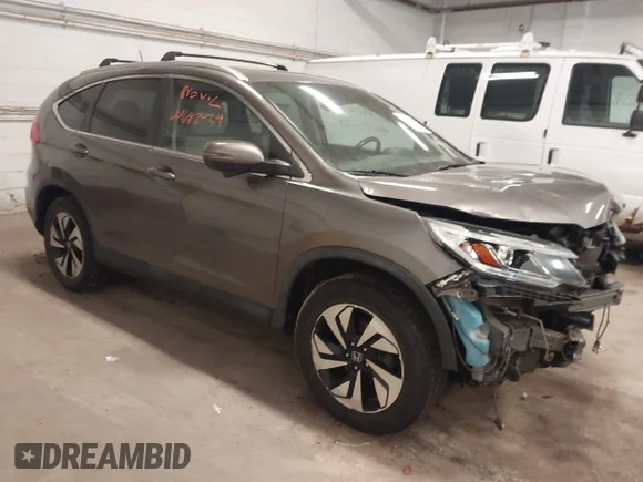 ✅ 2015 Honda CR-V Touring • VIN: 5J6RM4H97FL117209 • Lot: 44682439. Listed on IAAI with 98,279 mi. Free auction sales archive from the USA and detailed vehicle history report at DreamBid. Image 1.