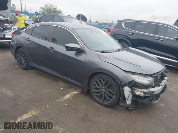 ✅ 2020 Honda Civic Si • VIN: 2HGFC1E52LH700874 • Lot: 41882473. Listed on IAAI with 95,453 mi. Free auction sales archive from the USA and detailed vehicle history report at DreamBid. Image 1.