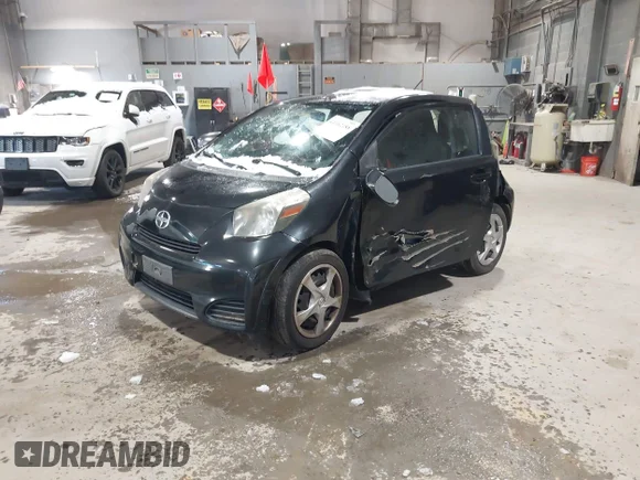 ✅ 2012 Scion iQ • VIN: JTNJJXB05CJ020391 • Лот: 44062188. Опубликован ранее на IAAI с пробегом 101 682 миль. Бесплатный доступ к архиву аукционных продаж из США и подробный отчёт об истории автомобиля на DreamBid. Изображение 2.