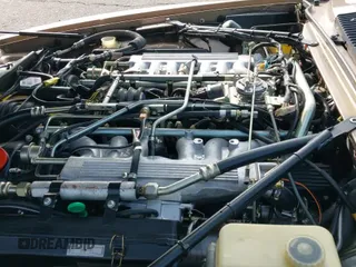 ✅ 1990 Jaguar XJS • VIN: SAJNW4847LC166796 • Лот: 42370955. Опубликован ранее на IAAI с пробегом 71 418 миль. Бесплатный доступ к архиву аукционных продаж из США и подробный отчёт об истории автомобиля на DreamBid. Изображение 12.