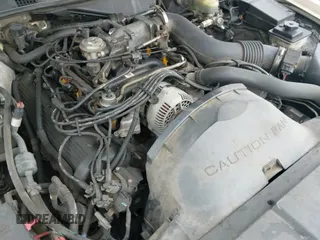 ✅ 1997 Lincoln Town Car Cartier • VIN: 1LNLM83W3VY708148 • Лот: 41853313. Опубликован ранее на IAAI с пробегом 207 293 миль. Бесплатный доступ к архиву аукционных продаж из США и подробный отчёт об истории автомобиля на DreamBid. Изображение 13.