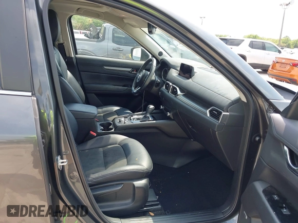 ✅ 2019 Mazda CX-5 Touring • VIN: JM3KFACM2K0690906 • Lot: 44683515. Wystawiony na IAAI z przebiegiem 94 016 mil. Bezpłatny archiwum sprzedaży aukcyjnych z USA i szczegółowy raport historii pojazdu na DreamBid. Zdjęcie 5.