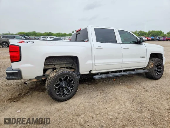 ✅ 2018 Chevrolet Silverado 1500 LT • VIN: 3GCUKREC6JG585537 • Lot: 50687856. Wystawiony na Copart z przebiegiem 94 692 mil. Bezpłatny archiwum sprzedaży aukcyjnych z USA i szczegółowy raport historii pojazdu na DreamBid. Zdjęcie 3.