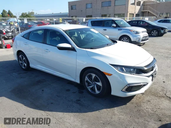 ✅ 2019 Honda Civic LX • VIN: 19XFC2F6XKE214447 • Лот: 45302769. Опубліковано раніше на IAAI з пробігом 35 866 миль. Безкоштовний доступ до архіву аукціонних продажів зі США та докладний звіт про історію автомобіля на DreamBid. Зображення 1.