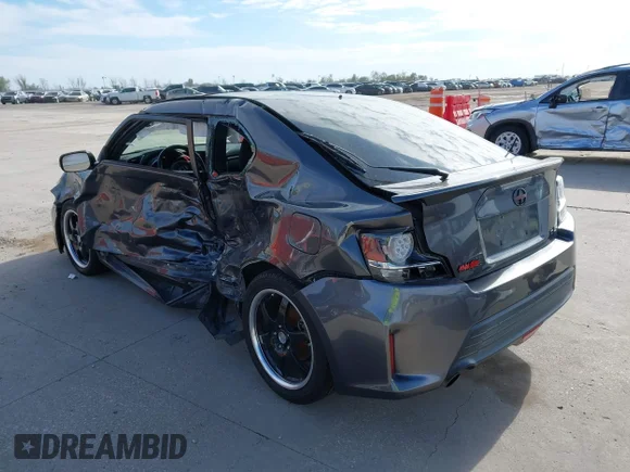 ✅ 2016 Scion tC Release Series 10.0 • VIN: JTKJF5C78GJ023421 • Lot: 43814129. Wystawiony na IAAI z przebiegiem 140 479 mil. Bezpłatny archiwum sprzedaży aukcyjnych z USA i szczegółowy raport historii pojazdu na DreamBid. Zdjęcie 3.