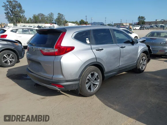 ✅ 2018 Honda CR-V LX • VIN: 2HKRW6H35JH220696 • Lot: 44964952. Wystawiony na IAAI z przebiegiem 30 911 mil. Bezpłatny archiwum sprzedaży aukcyjnych z USA i szczegółowy raport historii pojazdu na DreamBid. Zdjęcie 4.