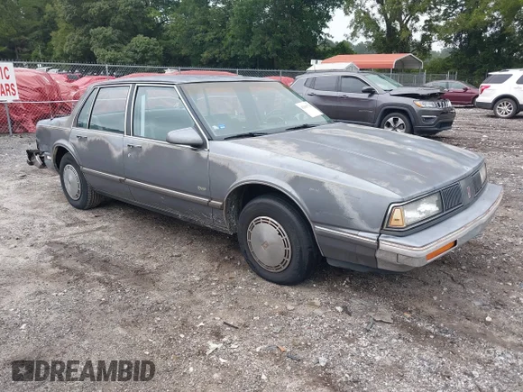✅ 1989 Oldsmobile Delta • VIN: 1G3HN54C1K1809364 • Lot: 42963729. Listed on IAAI with 168,541 mi. Free auction sales archive from the USA and detailed vehicle history report at DreamBid. Image 1.