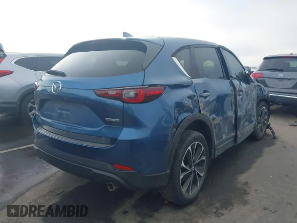 ✅ 2022 Mazda CX-5 S Premium • VIN: JM3KFBDM6N1607156 • Lot: 44308997. Wystawiony na IAAI z przebiegiem 45 306 mil. Bezpłatny archiwum sprzedaży aukcyjnych z USA i szczegółowy raport historii pojazdu na DreamBid. Zdjęcie 4.