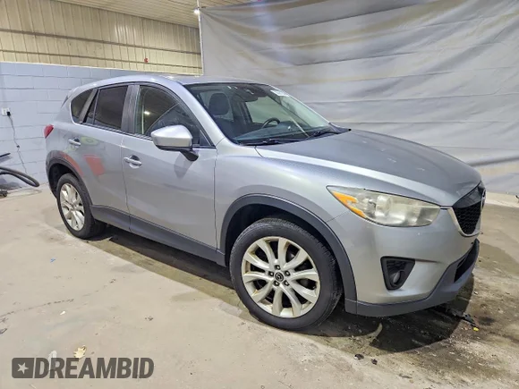 ✅ 2014 Mazda CX-5 Grand Touring • VIN: JM3KE4DY4E0321409 • Lot: 58587256. Wystawiony na Copart z przebiegiem 178 983 mil. Bezpłatny archiwum sprzedaży aukcyjnych z USA i szczegółowy raport historii pojazdu na DreamBid. Zdjęcie 4.