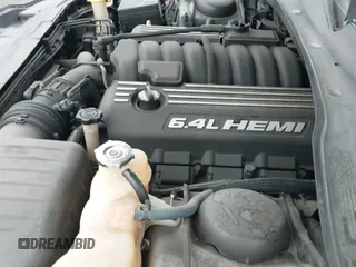 ✅ 2013 Chrysler 300 SRT-8 • VIN: 2C3CCAFJ9DH576184 • Лот: 42162364. Опубликован ранее на IAAI с пробегом 104 021 миль. Бесплатный доступ к архиву аукционных продаж из США и подробный отчёт об истории автомобиля на DreamBid. Изображение 20.