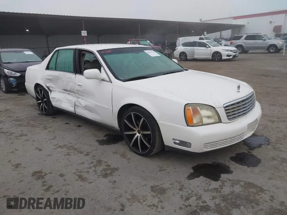 ✅ 2002 Cadillac DeVille • VIN: 1G6KD54Y82U121366 • Lot: 44253734. Wystawiony na IAAI z przebiegiem 122 817 mil. Bezpłatny archiwum sprzedaży aukcyjnych z USA i szczegółowy raport historii pojazdu na DreamBid. Zdjęcie 1.
